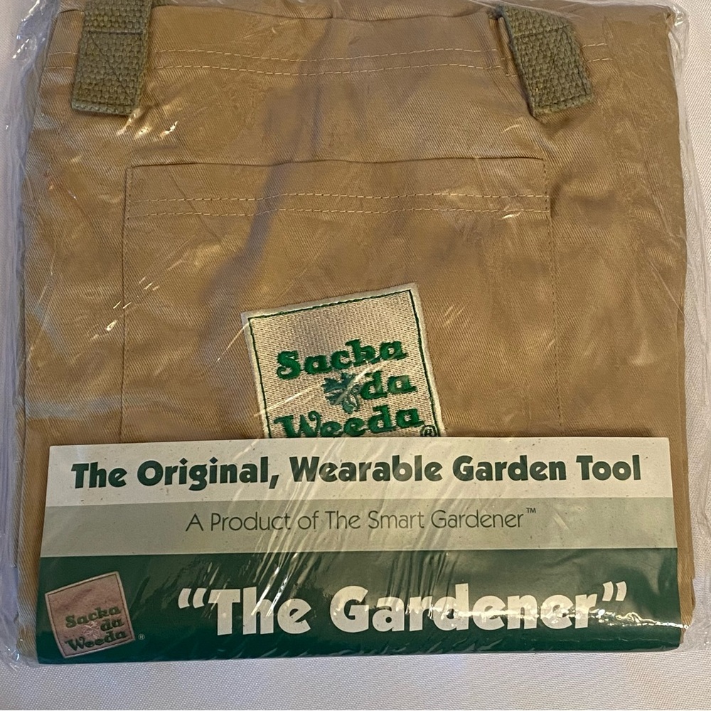 New in package  the Smart Gardener wearable garden tool. Ginger color.